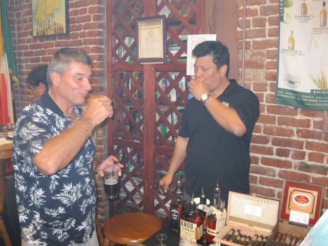 Owner Fred Remington and Mark Miyahira share a shot of Knob single barrel